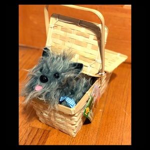 Toto in a basket (Wizard of Oz)